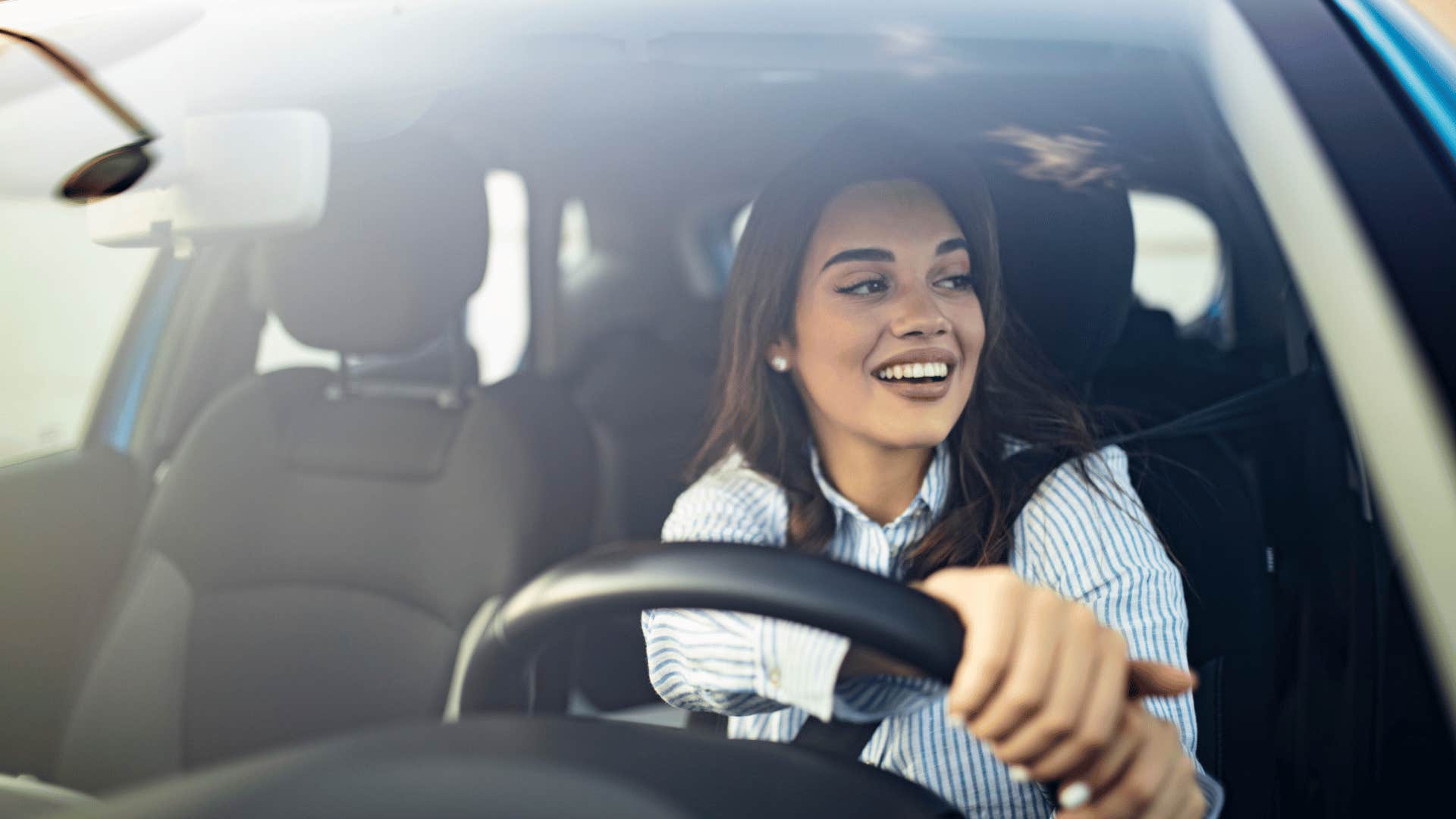 mindful woman driving a car