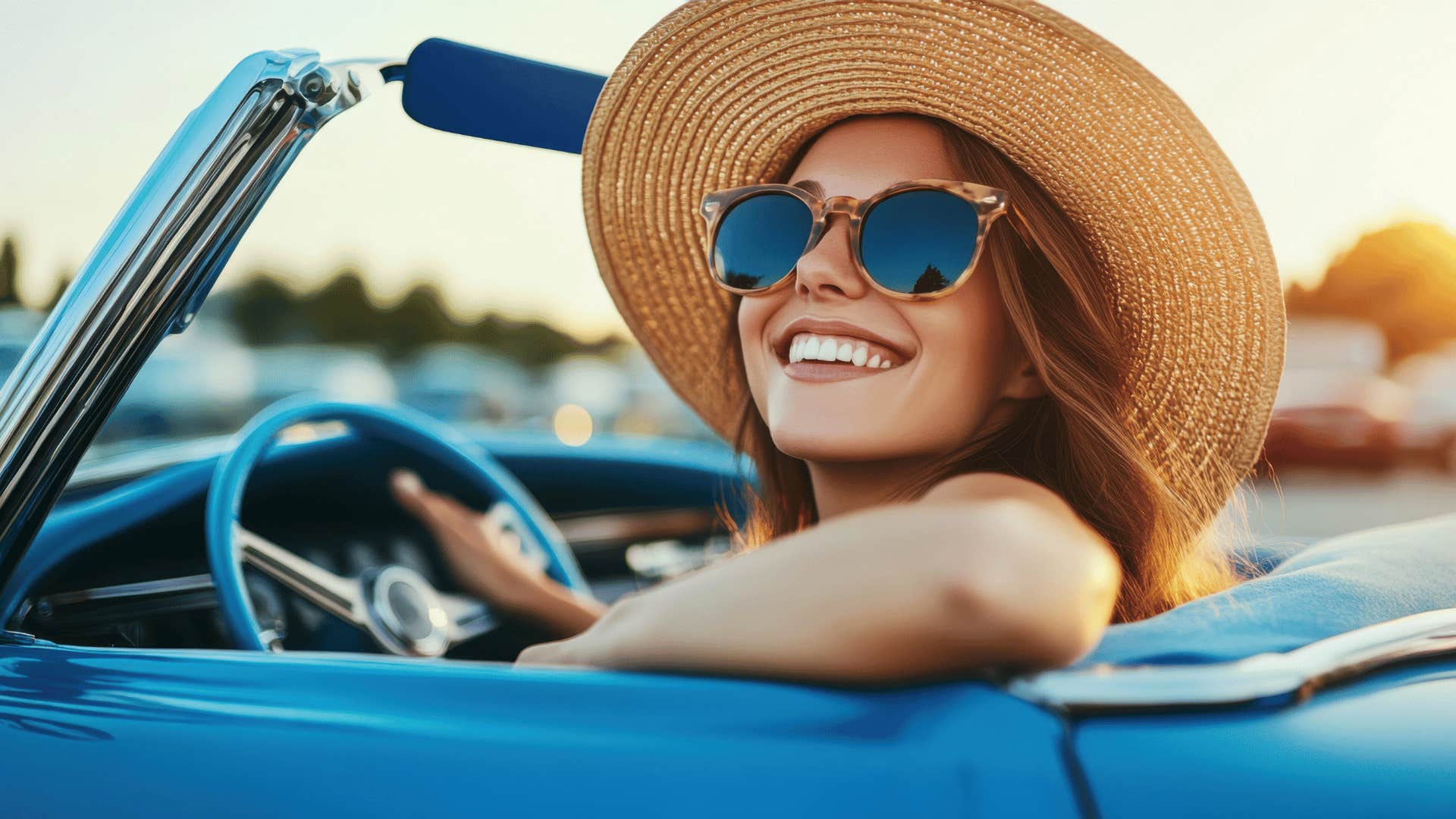 simple-minded woman smiling while driving