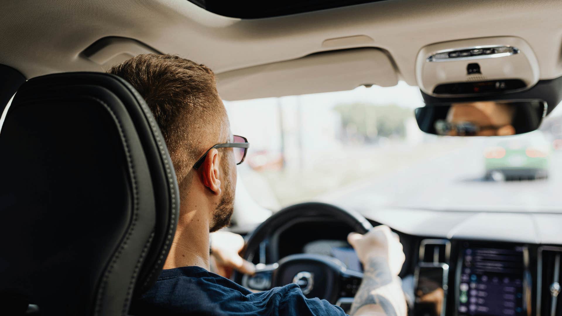 patient man driving a car without music playing