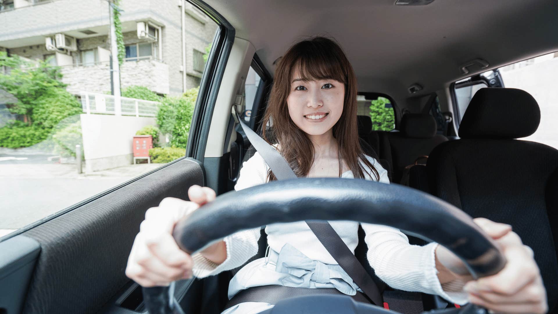 woman driving alone enjoying her solitude