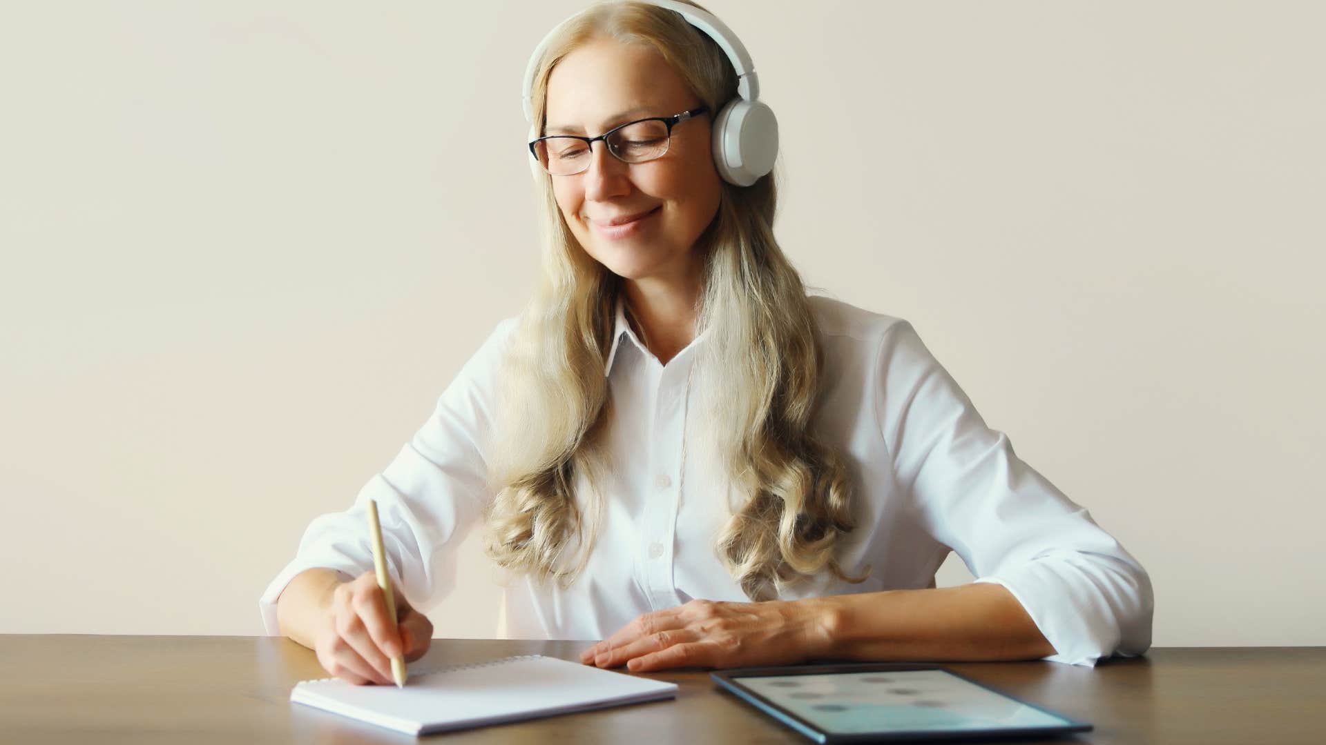 woman who's become more secure listening to music while working