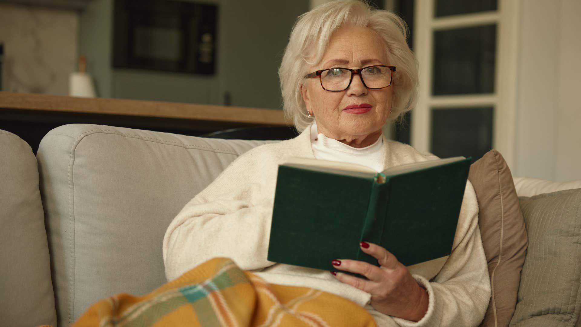 woman who's sick of wasting time reading at home