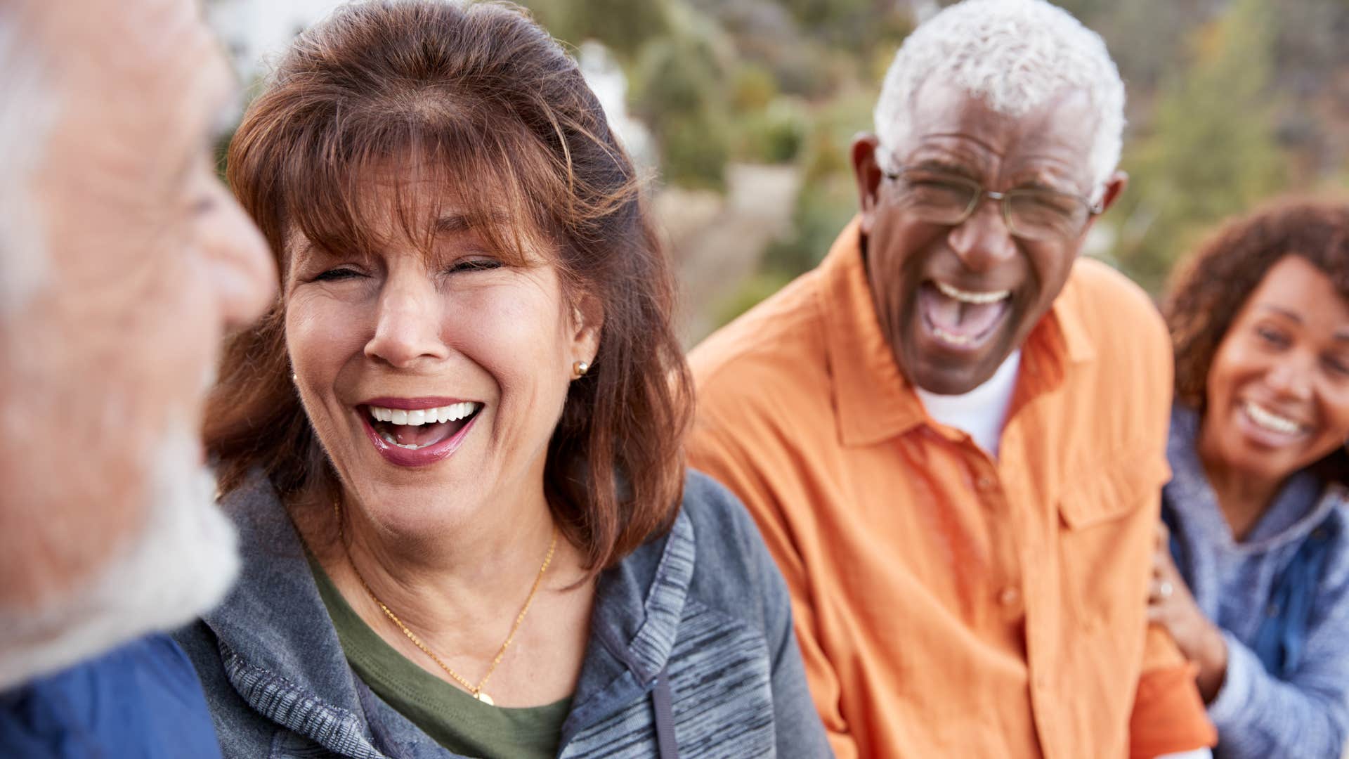 woman talking to strangers and smiling