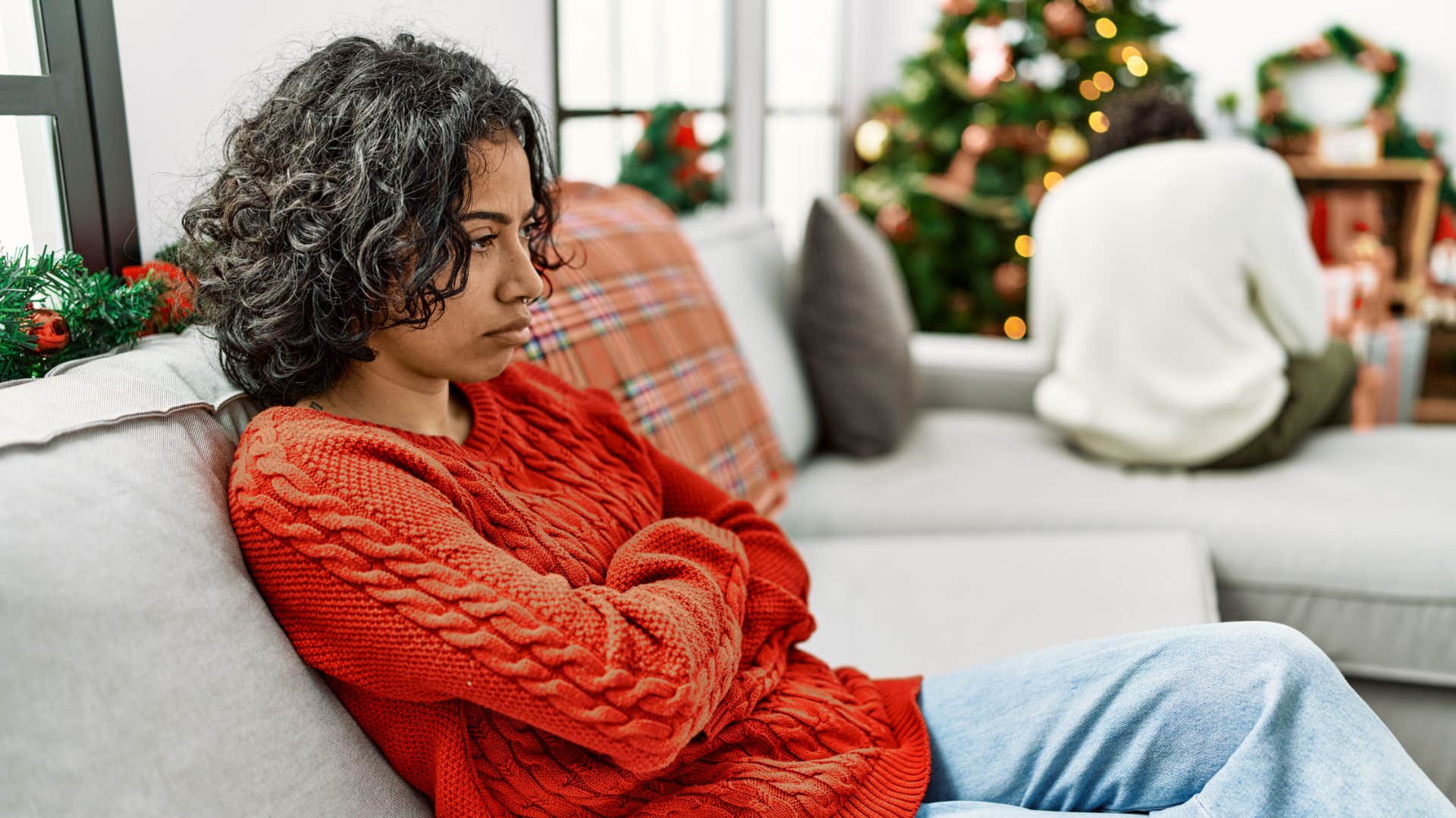 sad woman turned away from husband not making new traditions together