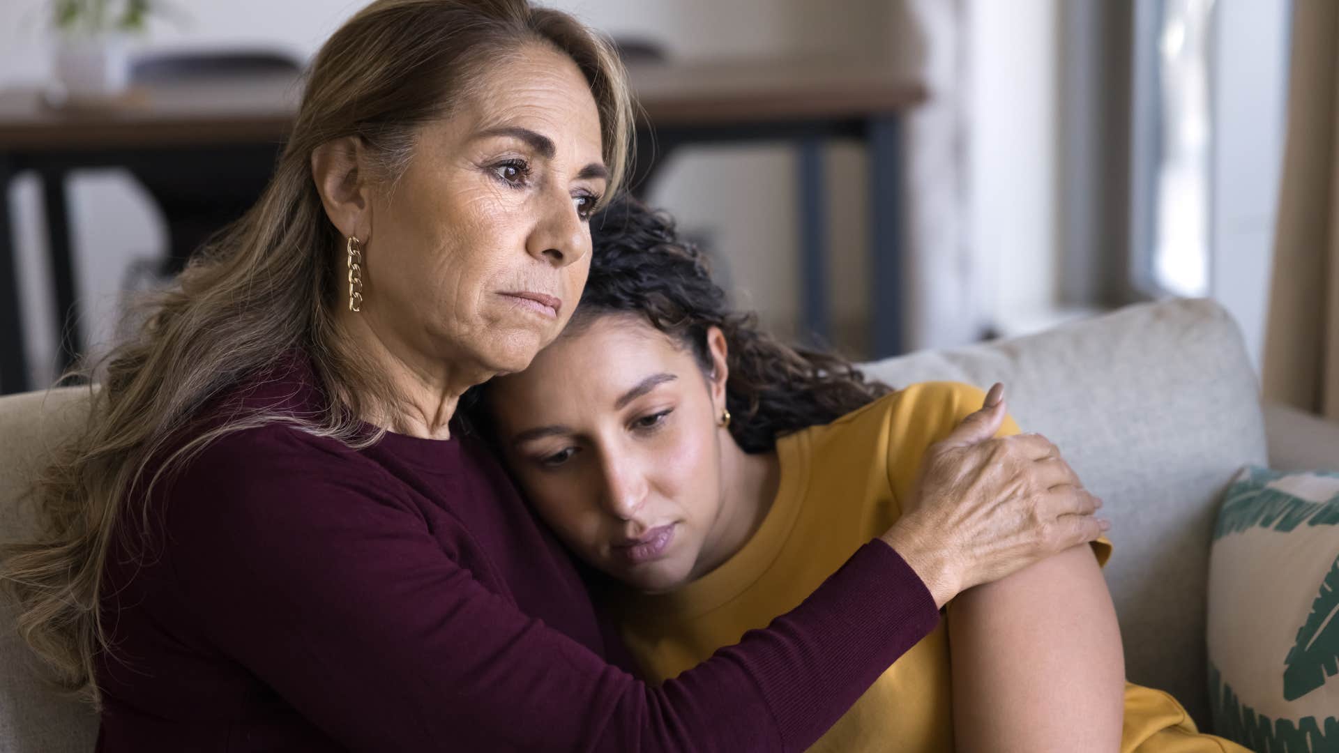 mom hugging daughter saying i understand completely