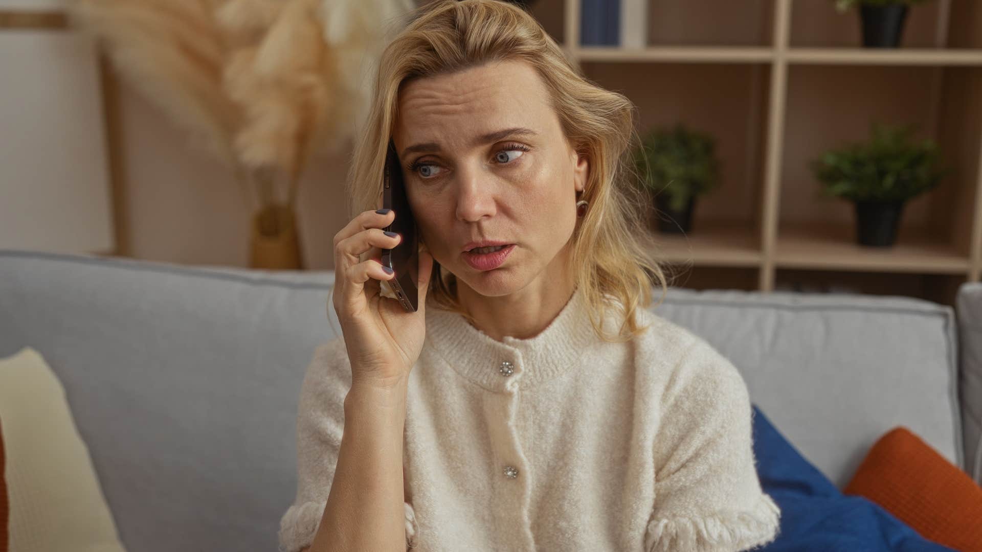 woman who was raised right telling person on the phone i'm here if you need me