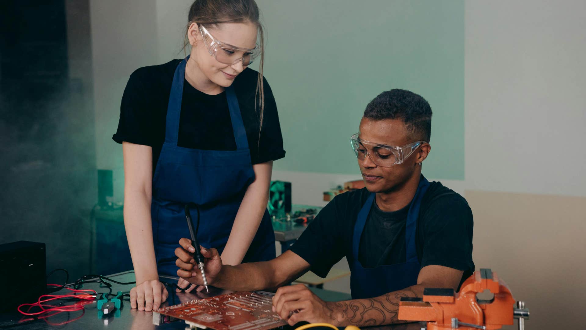 woman saying lets test it out and see what happens to colleague in lab
