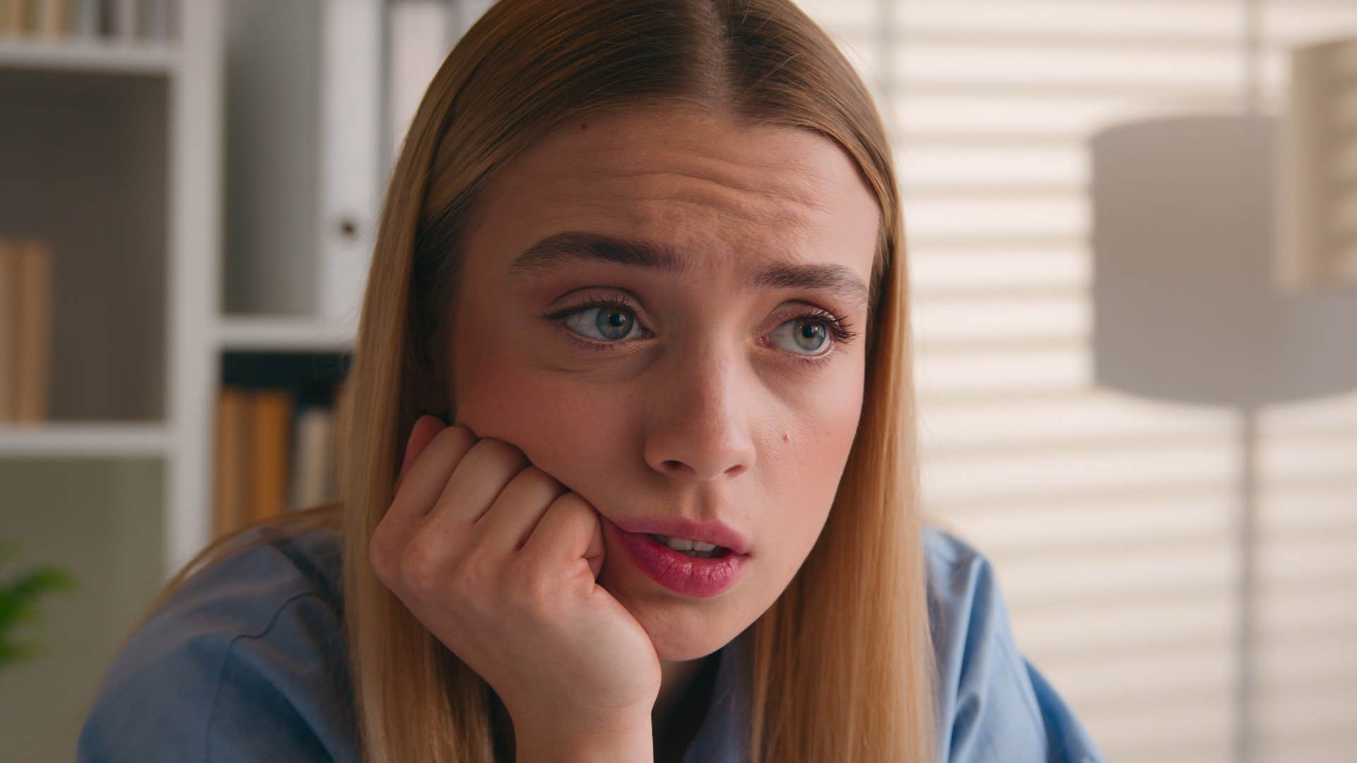 woman annoyed by not knowing something