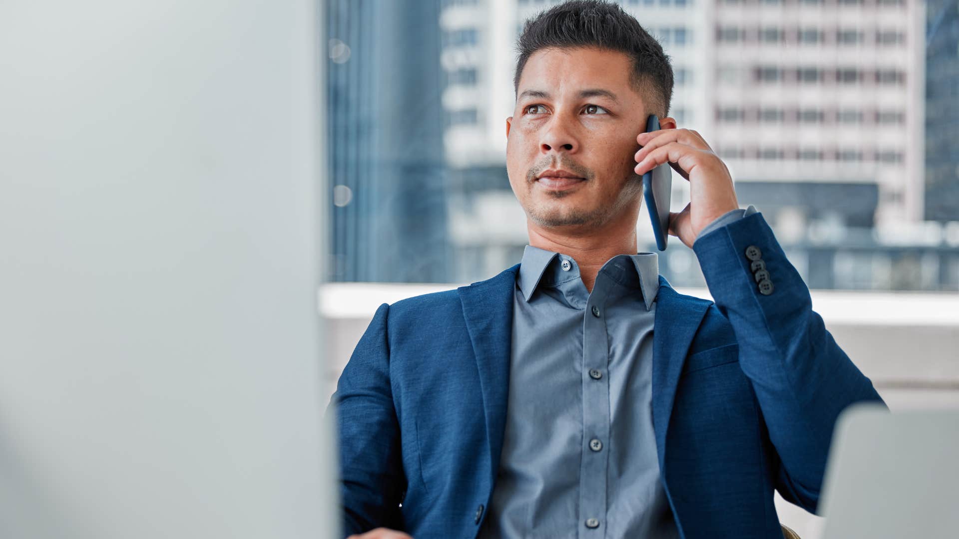 Man saying let's circle back to this on the phone