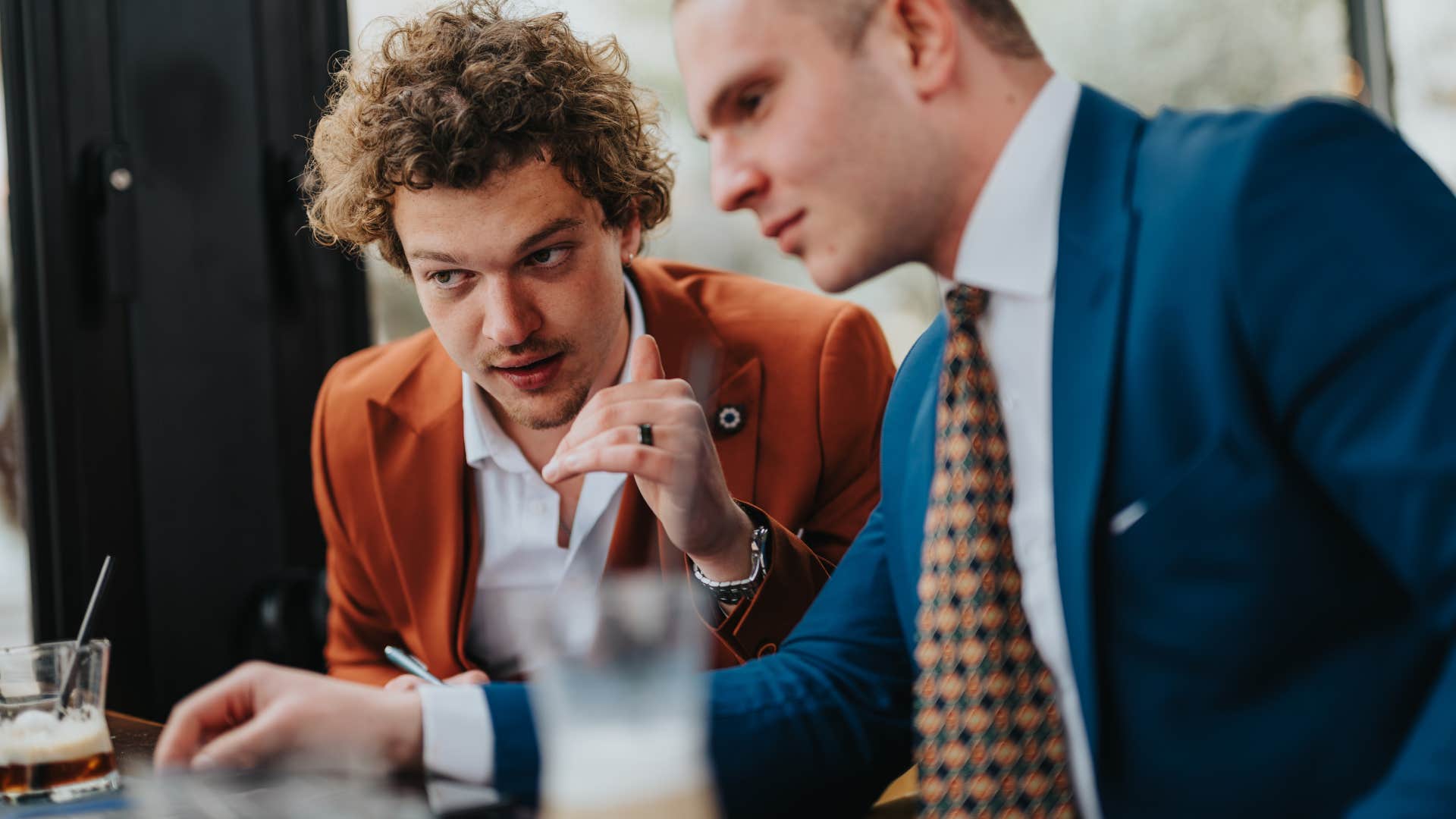 Man saying that's a common mistake to a co-worker