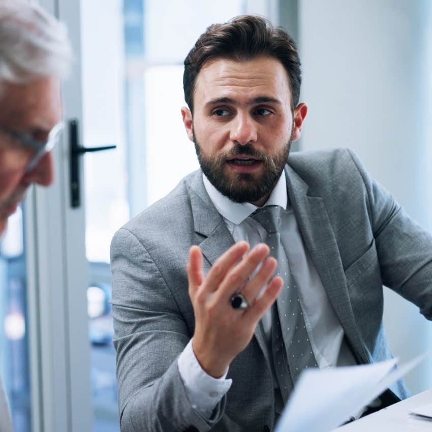 man talking to attention seeker at work
