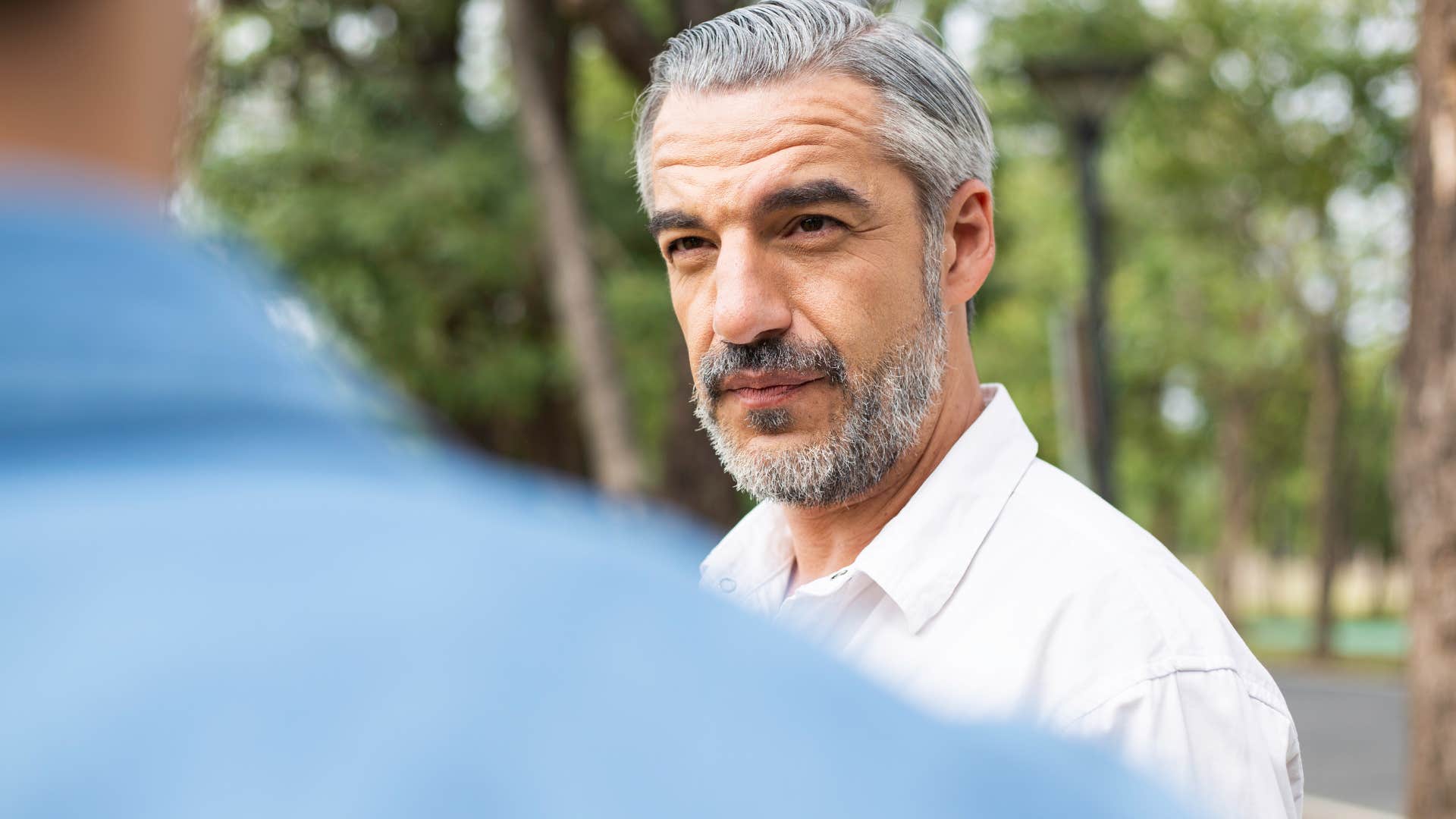 Man saying "you're allowed to be upset, not disrespectful" to his adult son.