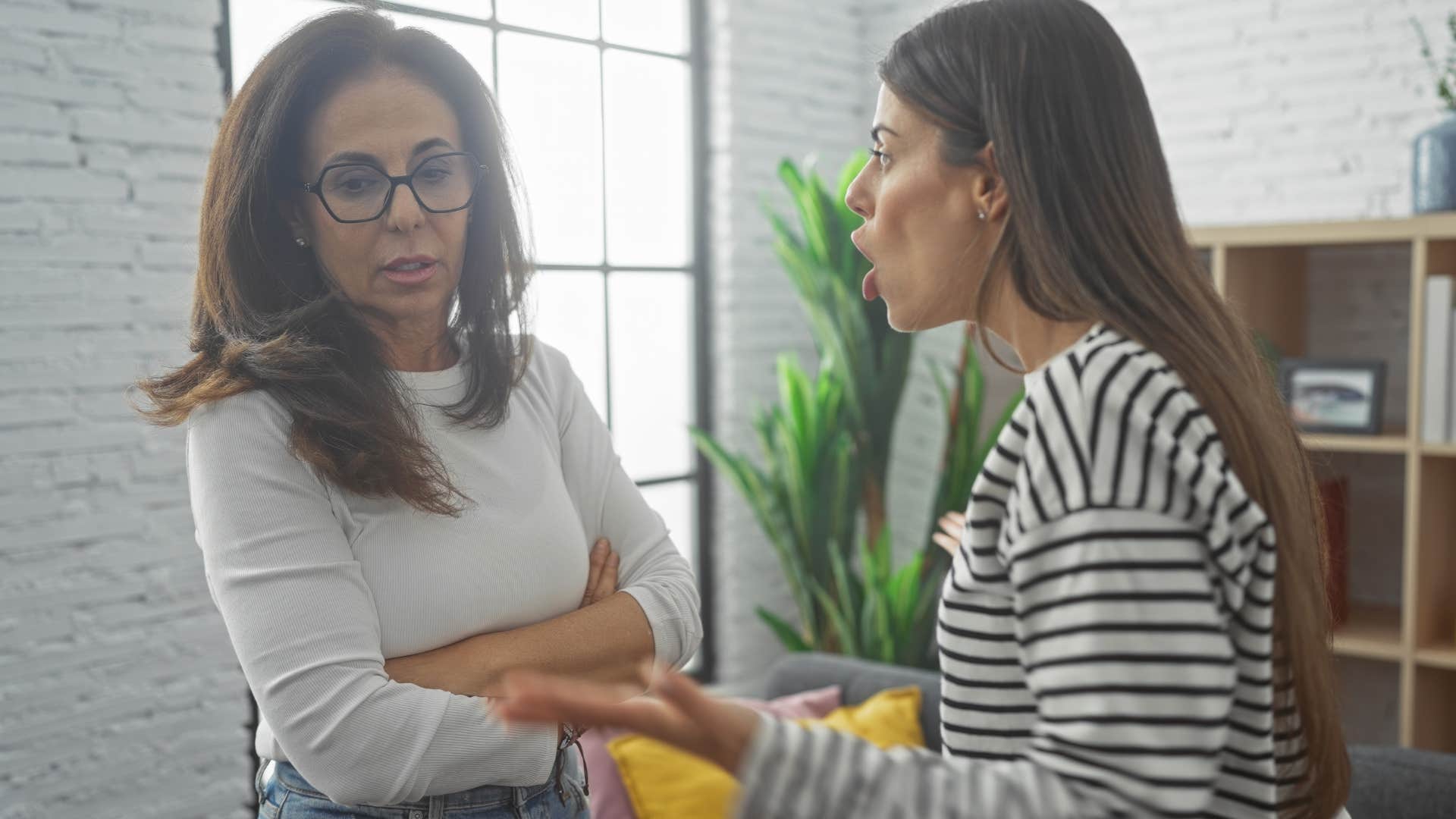 Woman saying "I hear your frustration" to her adult daughter.