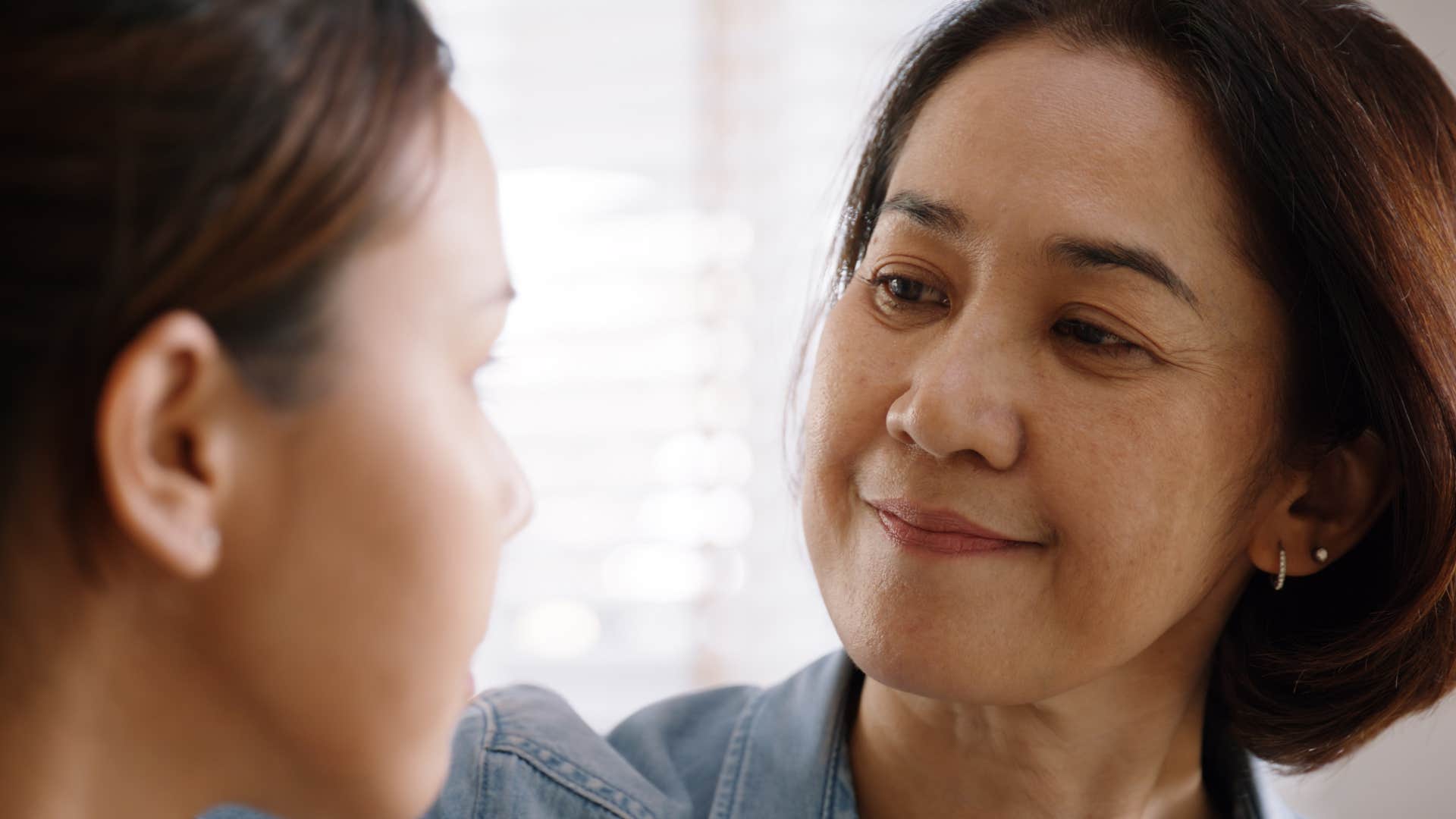 Woman saying "let's come back to this when we can be respectful" to her daughter.