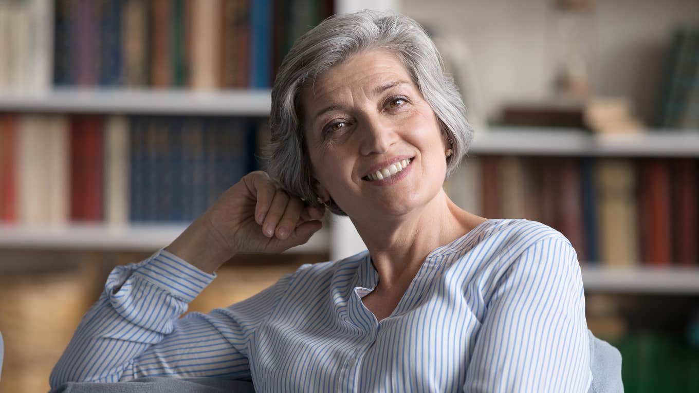 brilliant older woman smiling at home
