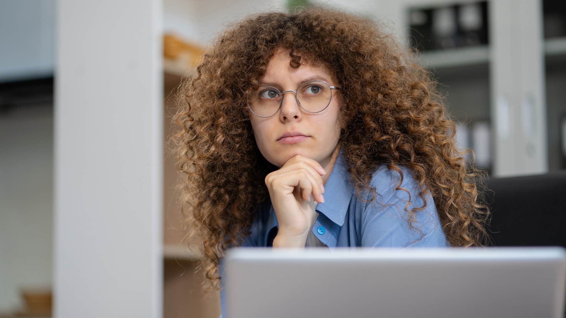 pensive gen z woman being pressured by activism