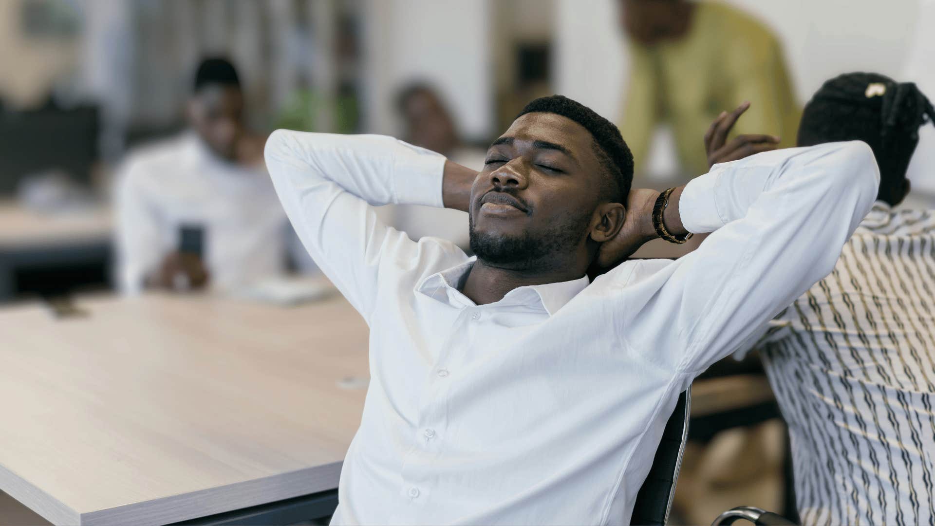 professional man stepping back when negativity becomes instense