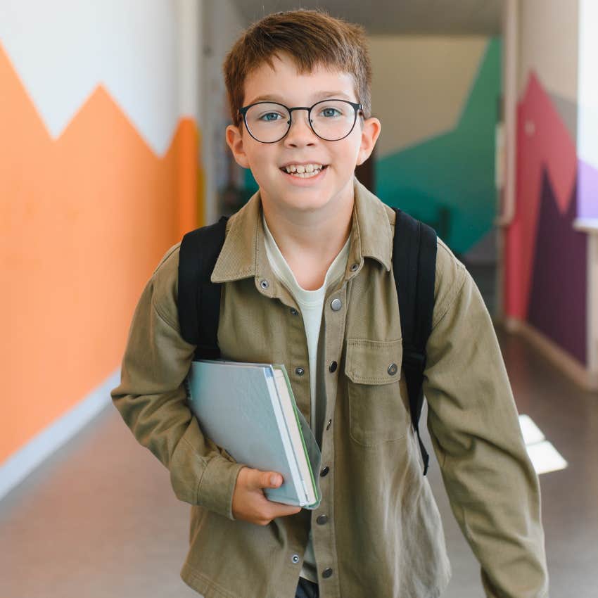 kid carrying around a hall pass at school