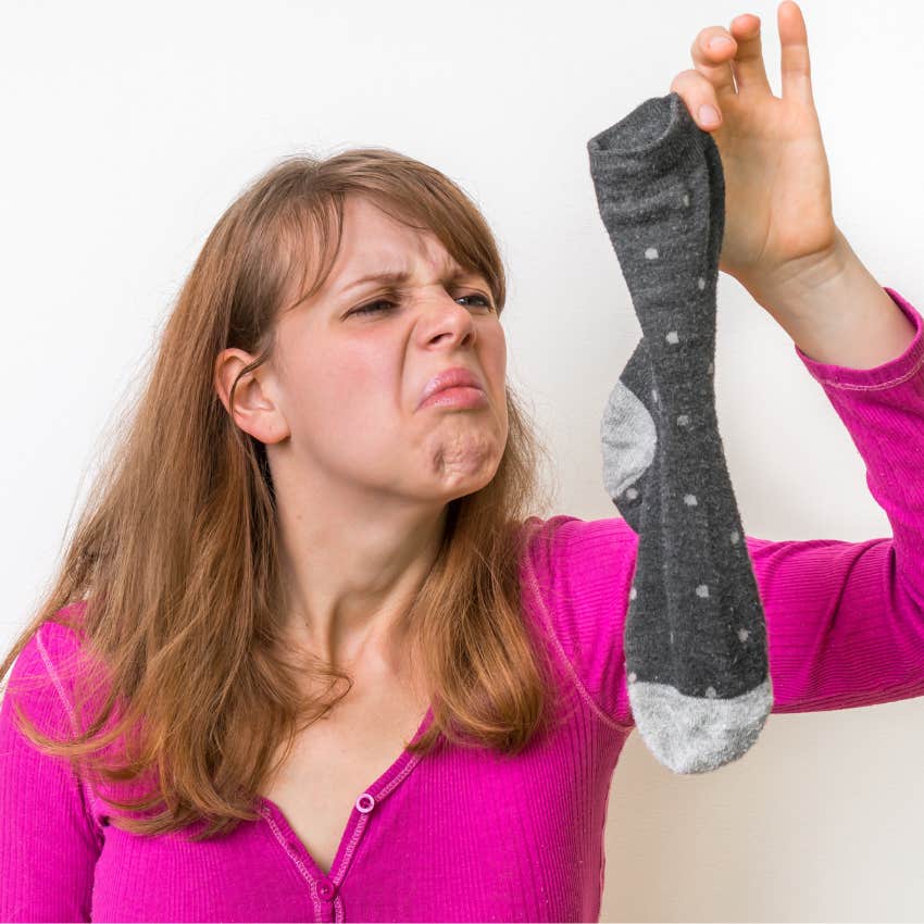 woman with stinky socks