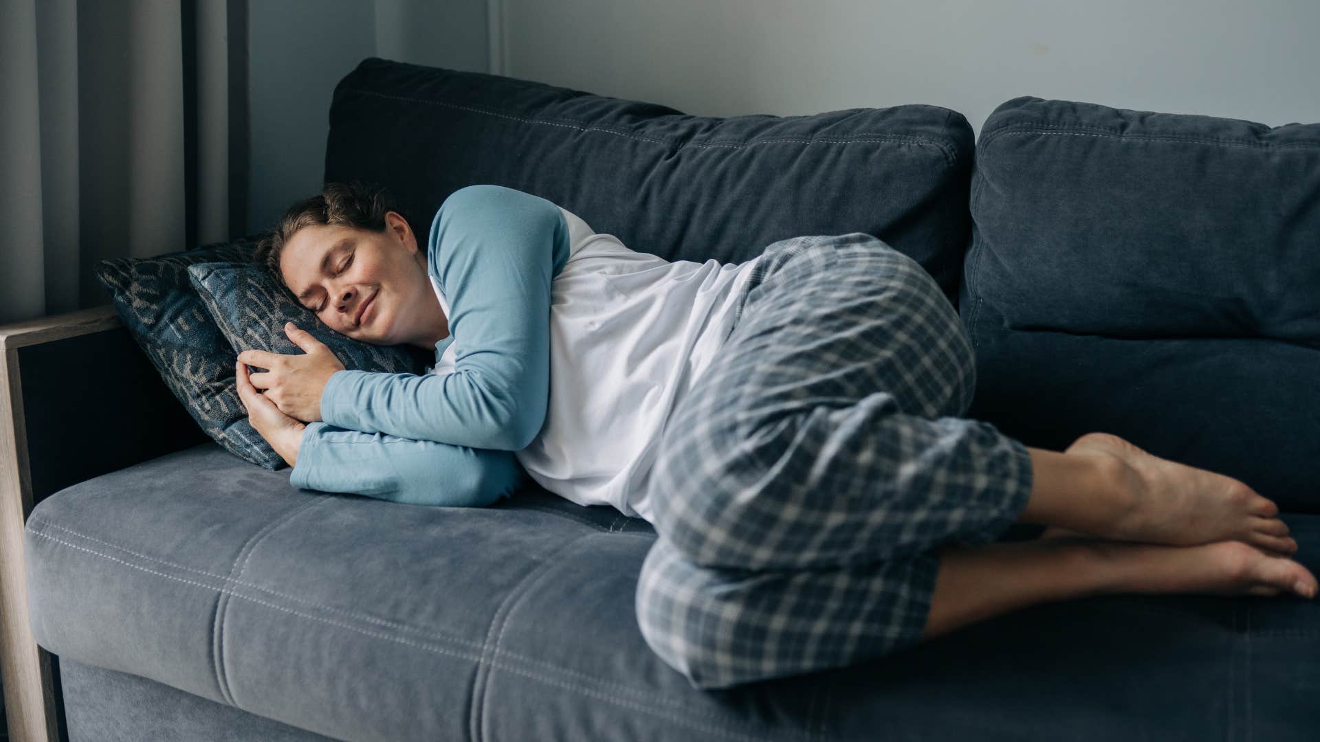 woman napping because it reduces risk of heart disease