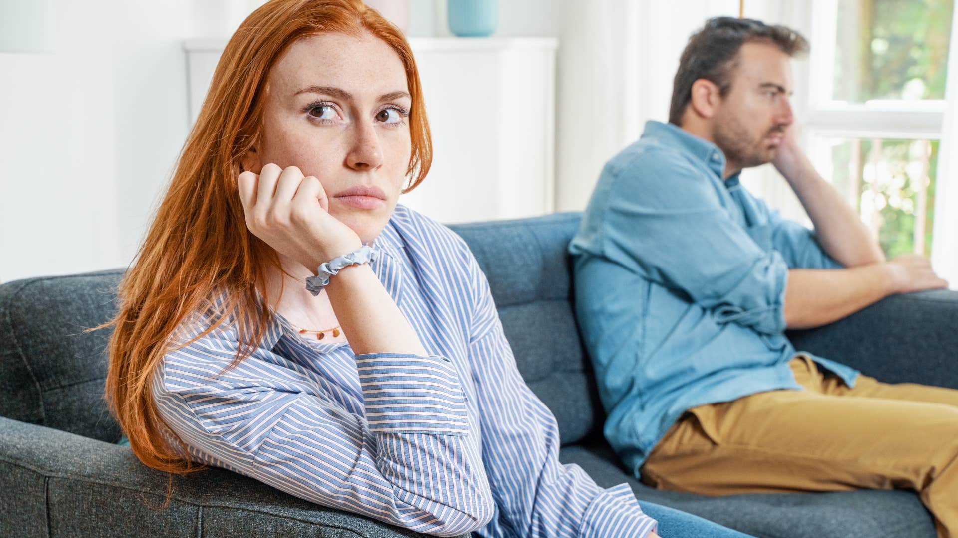 passive-aggressive woman ignoring husband