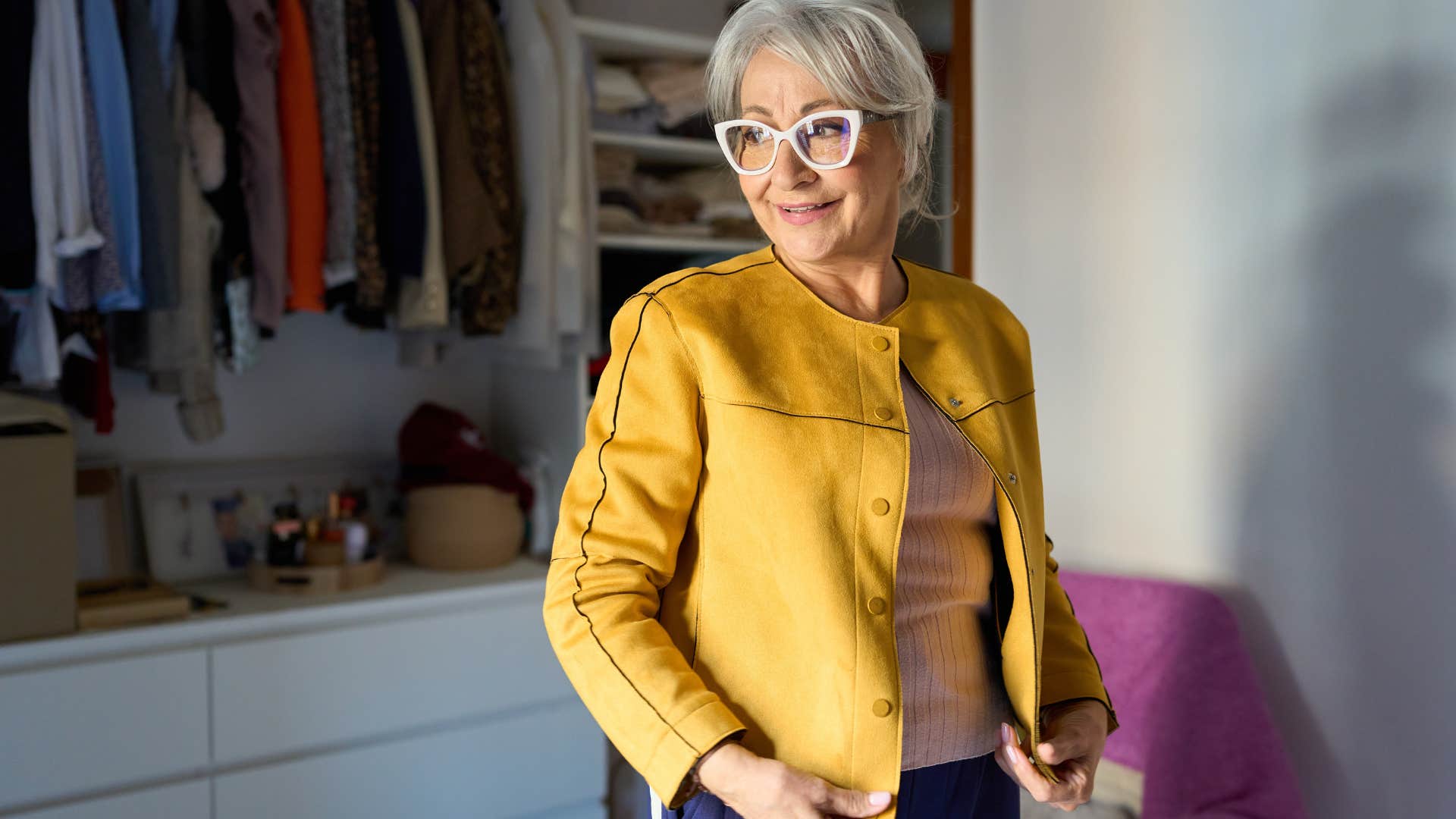 self-centered woman in her closet changing her clothes