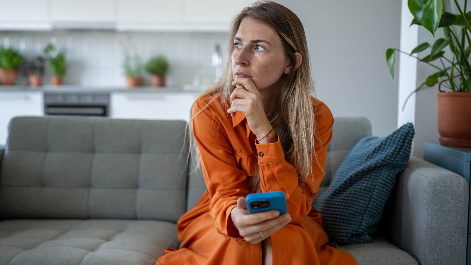 self-centered woman on the phone ranking herself socially