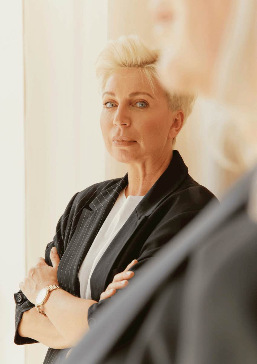 assertive older woman with a serious expression