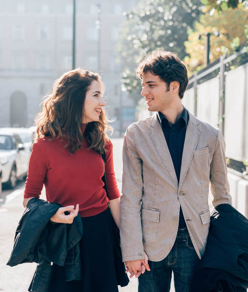 man walking woman home after date