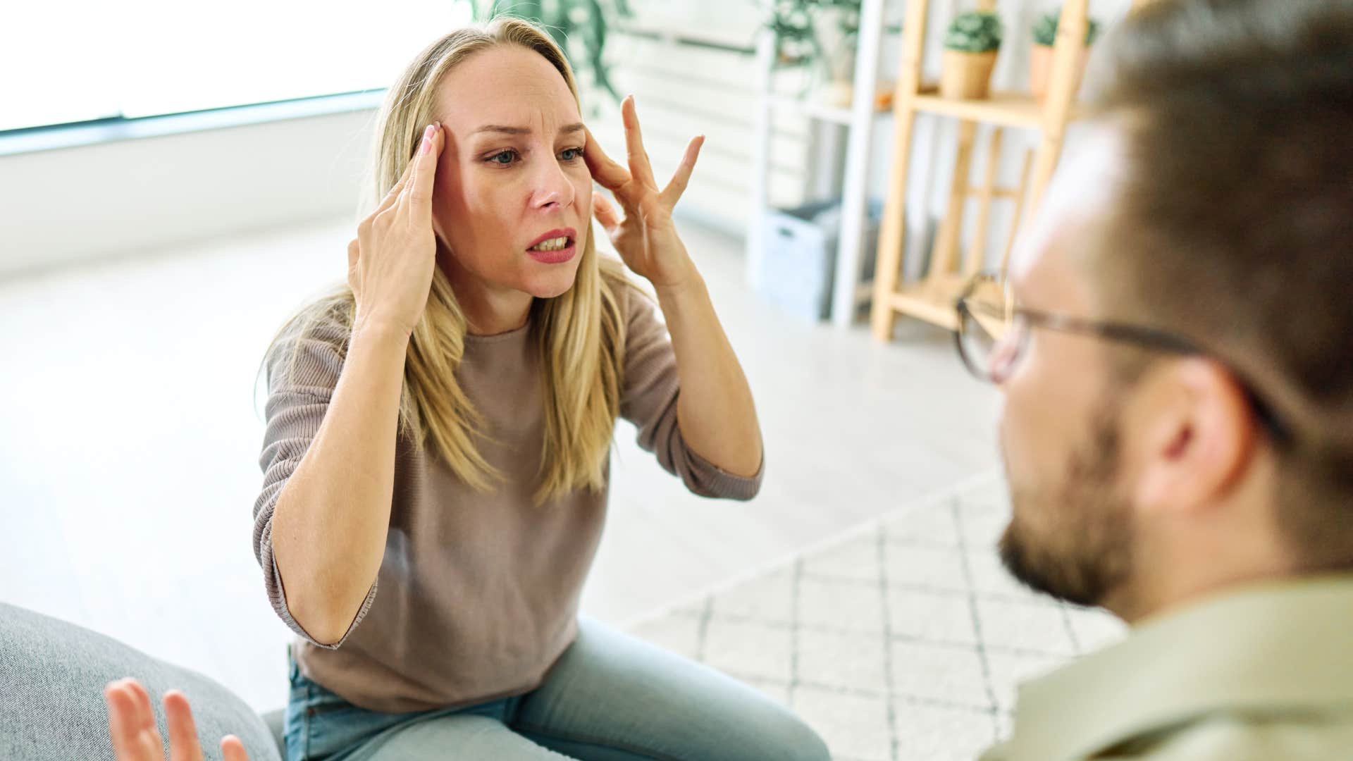 a needy woman gets upset when he hangs out with other women which drives her man away 