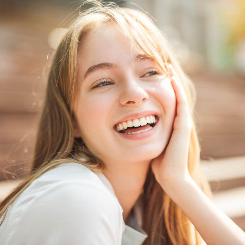 happy woman who trades but for and