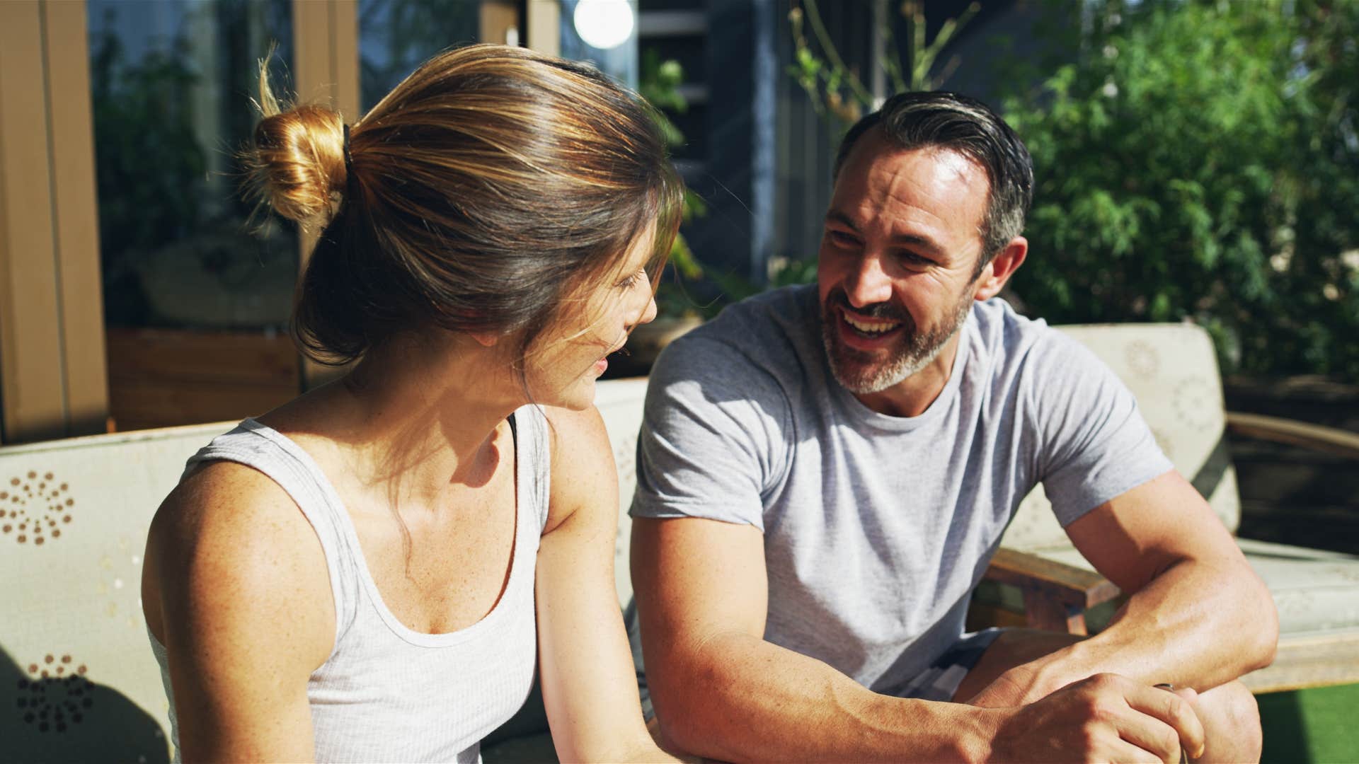 man actively listening to wife