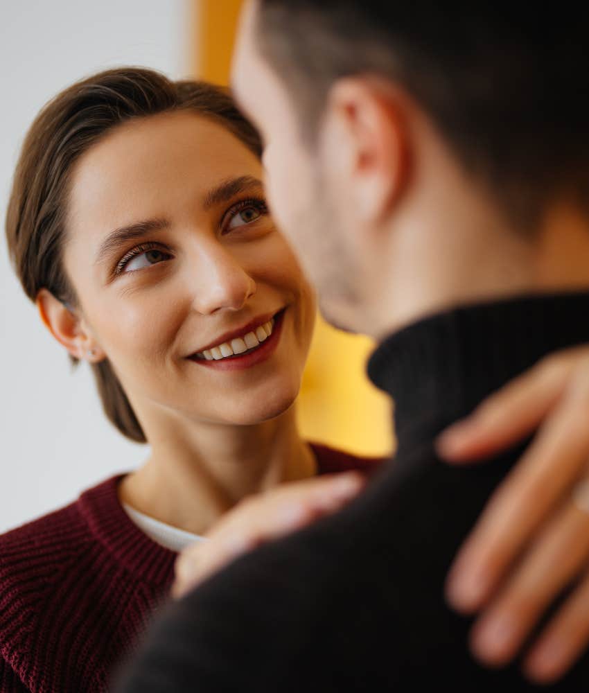 Happy woman creates space for man showing habit of decent wife