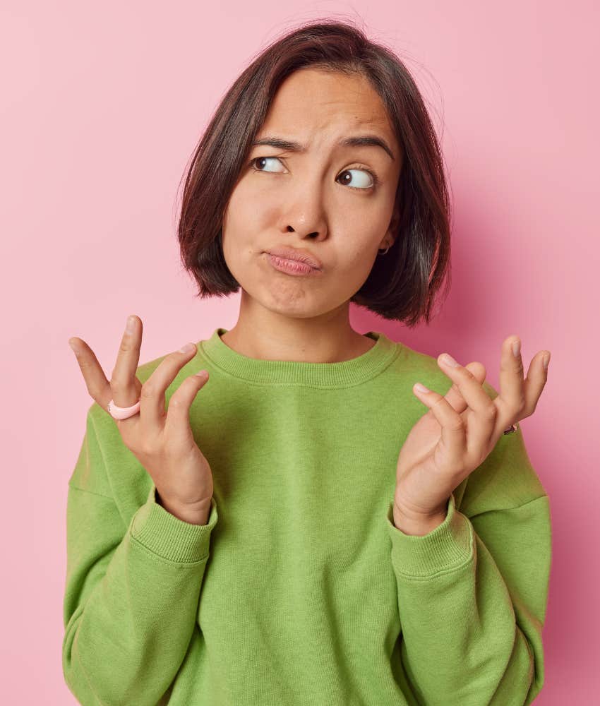 Annoyed person throws hands up showing healing from heartbreak is good
