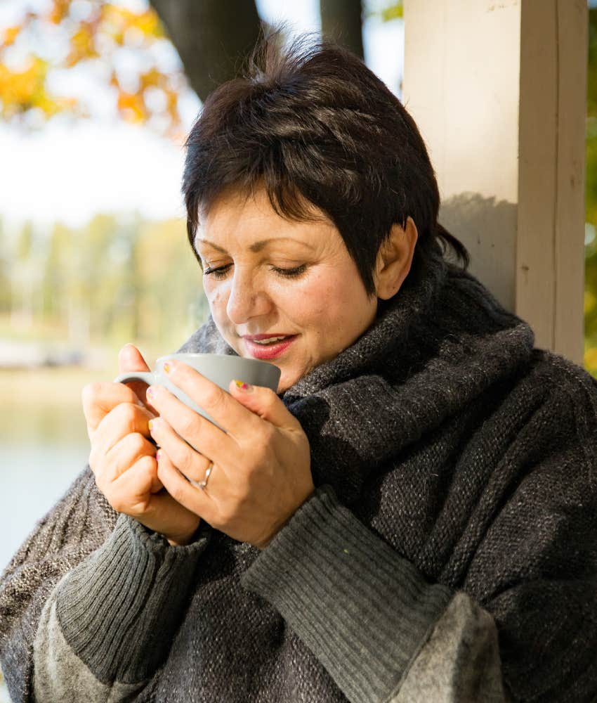 Relaxed person sips tea showing way to break cycle of anger