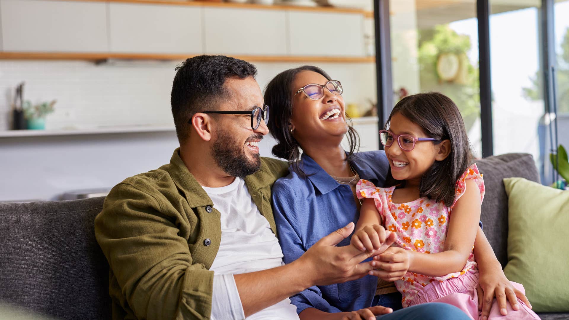 child with above average emotional intelligence as she enjoys spending time with family