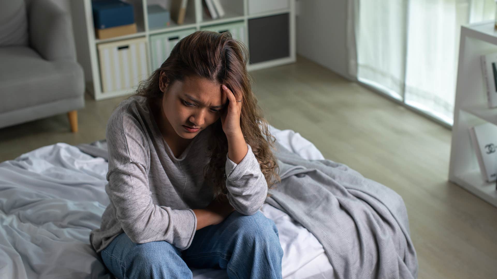 woman with low self-esteem who is unable to handle difficult feelings