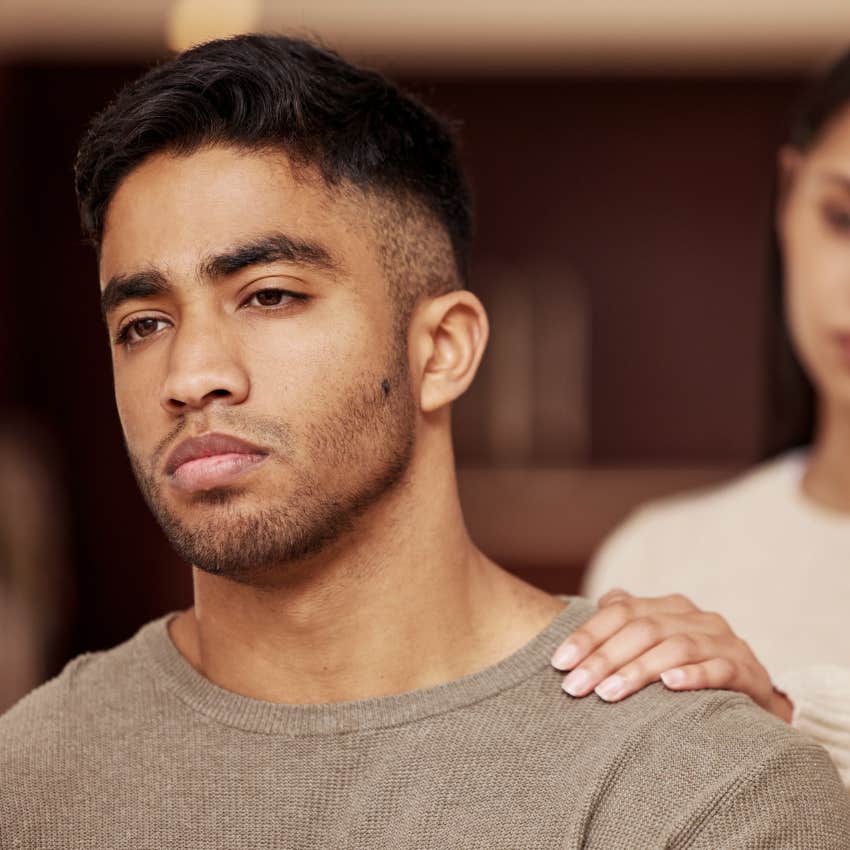 Man with rigidity turned away from his wife.