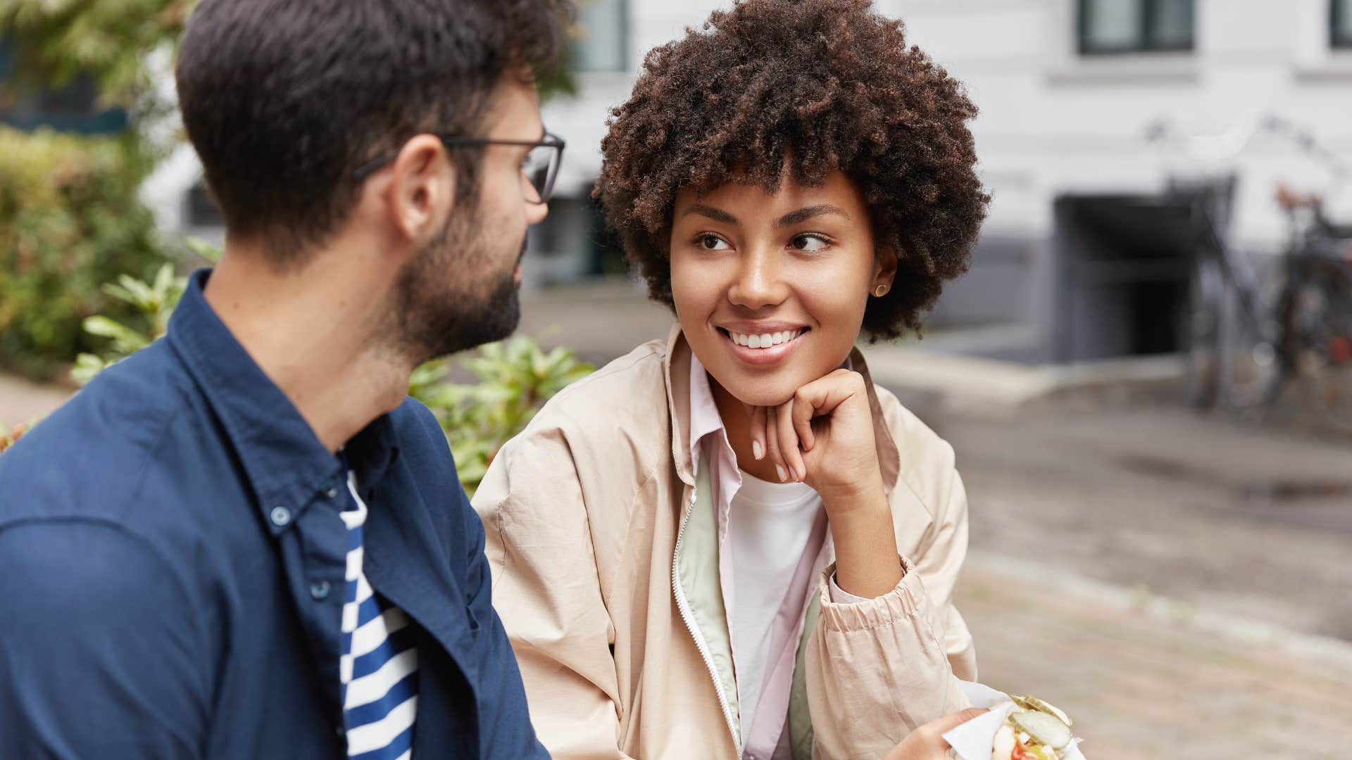healthy couple talking about current events