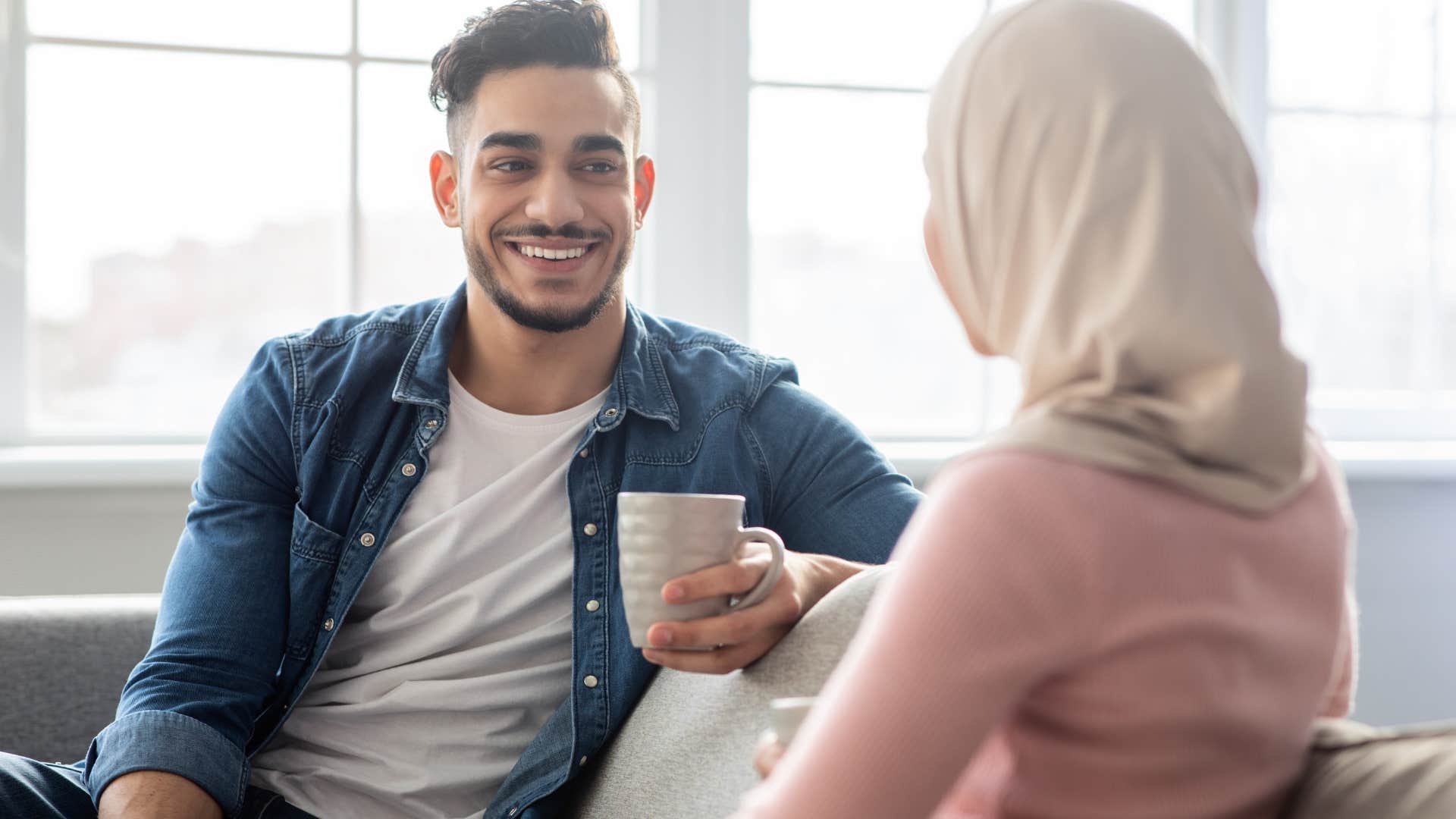 healthy couple talking about political viewpoints