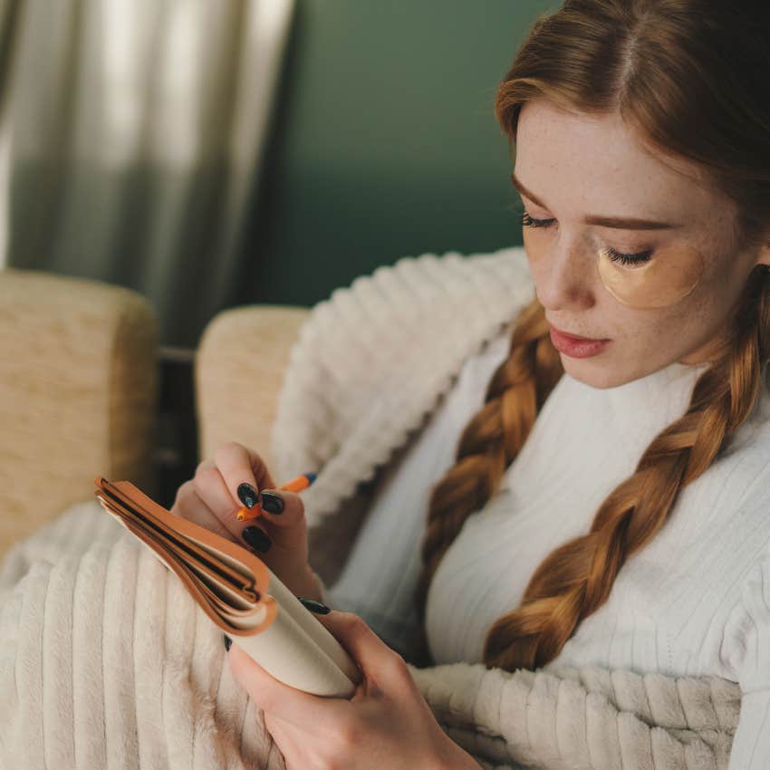 woman who wants to be happier by writing it down