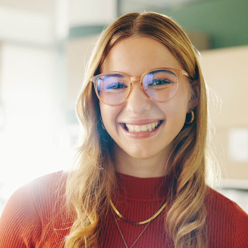woman who is a happier person as she smiles
