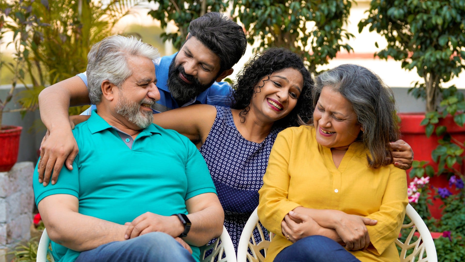 couple calming tense relationship with in-laws by planning activity both parties enjoy