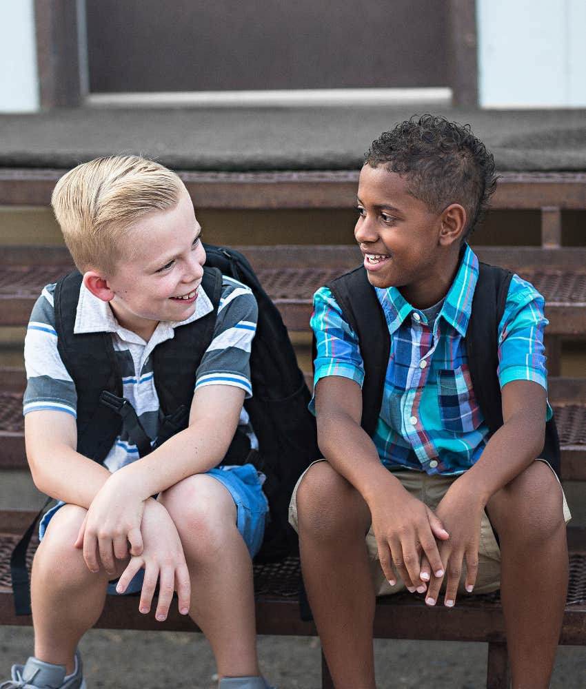 happy young boys talking at school