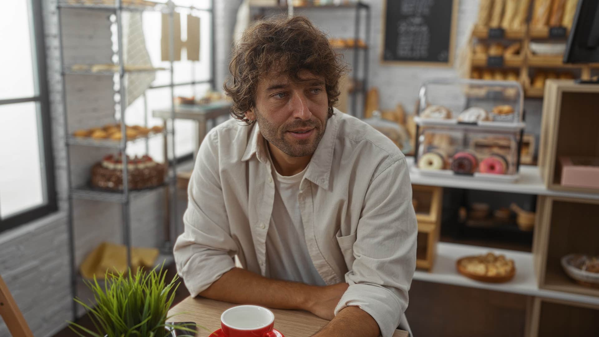 man in white outfit waiting as he says i shouldn't have to wait