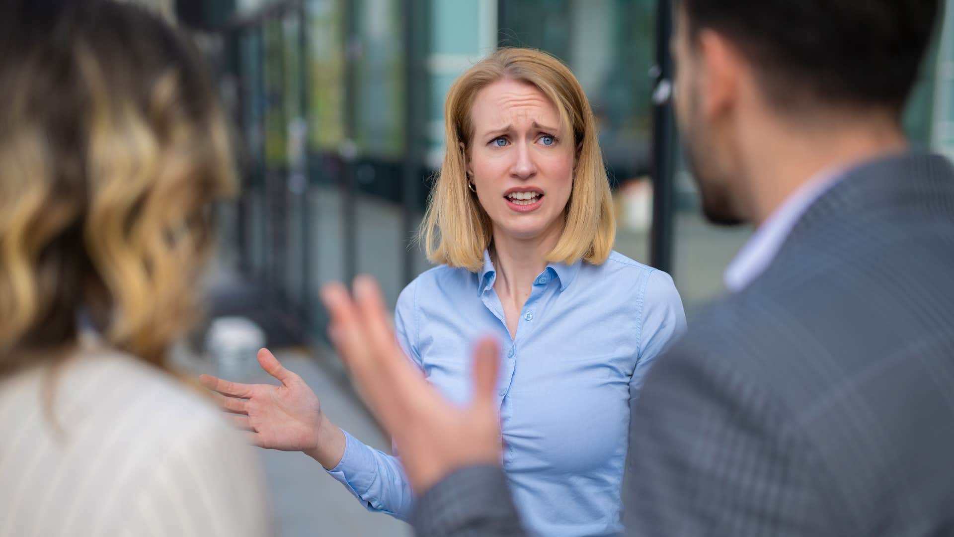 loser woman accusing coworkers of teaming up against her