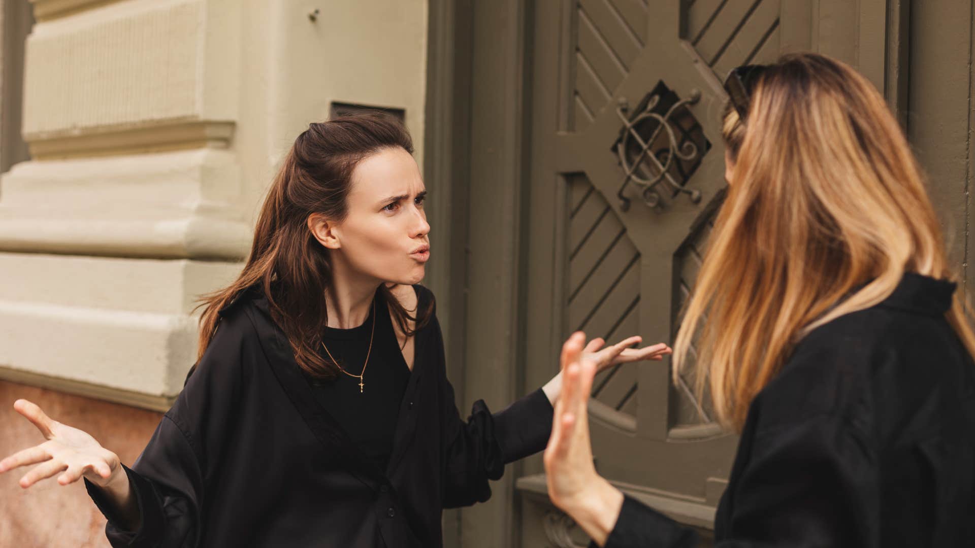 loser woman yelling at friend that she doesnt owe anyone anything