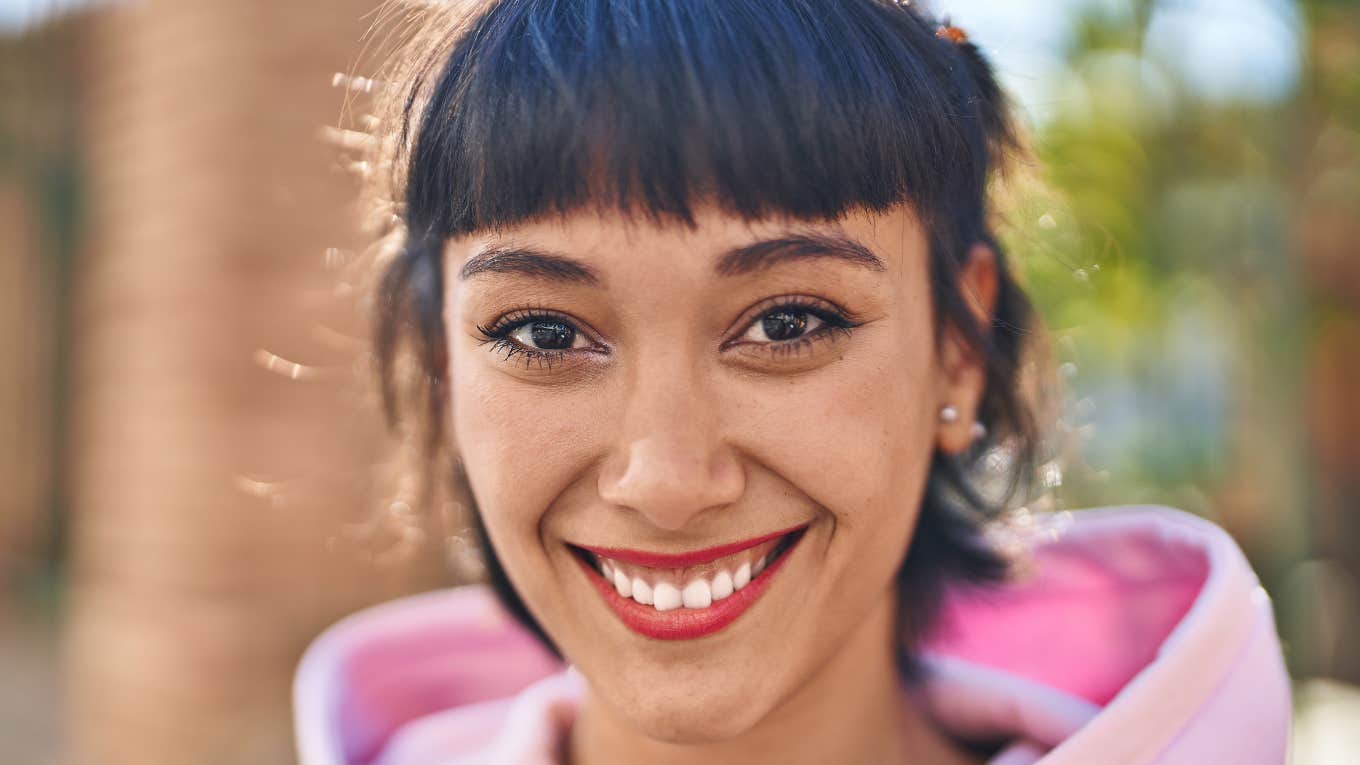 truly nice woman smiling outside
