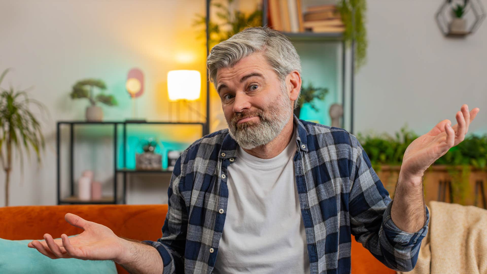 older man shrugging saying it could be worse