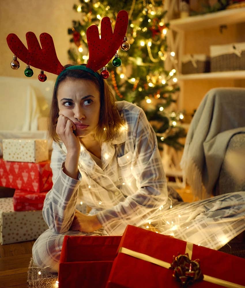 gen z woman upset after opening unwanted christmas gift
